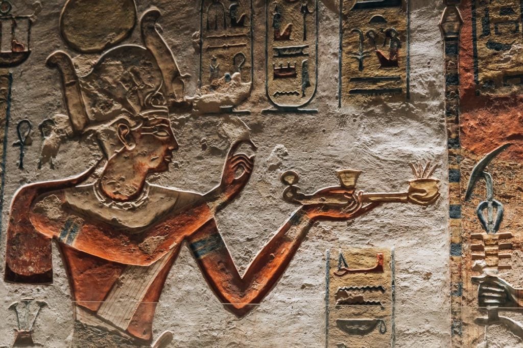 Egyptian Hieroglyphs of a Pharaoh smoking a pipe 