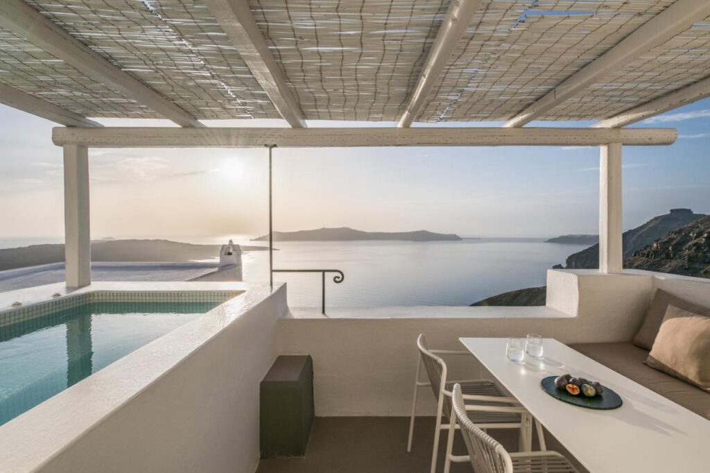 Sheltered plunge pool with panoramic views at Enigma Suites on Santorini island