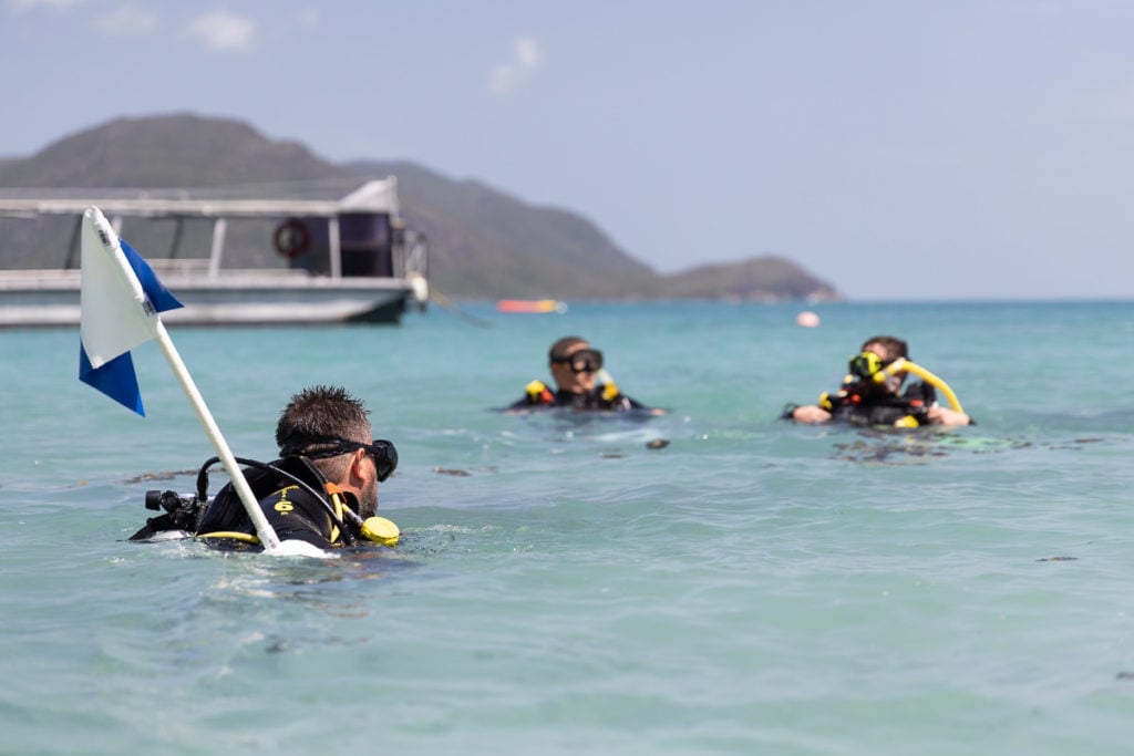 Scuba divers near Cairns