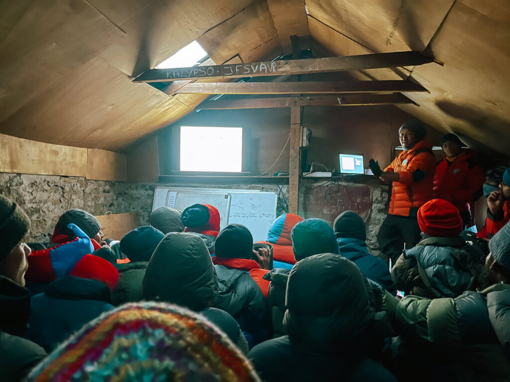 Mountaineering students receiving lecture at HMI Base Camp