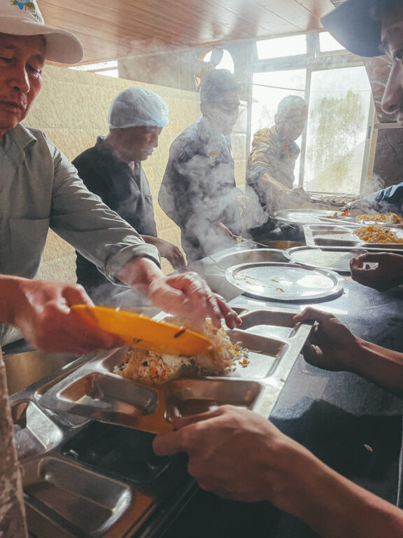 Chefs preparing food at the Indian Mountaineering School