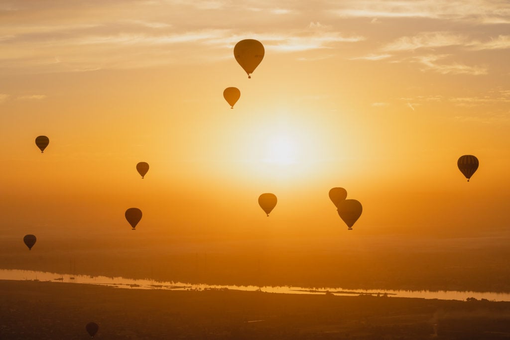 Hot air balloons over the River Nile