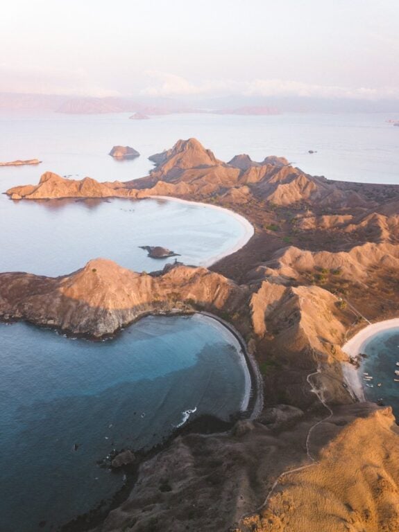 PADAR ISLAND DRONE PHOTO SUNRISE, WANUA ADVENTURES BOAT TRIP FROM LOMBOK TO KOMODO
