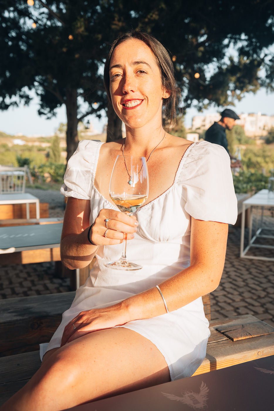 Girl drinking wine at Markus Divinus winery