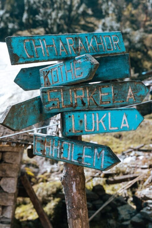 Sign showing directions to Lukla and other Himalayan villages