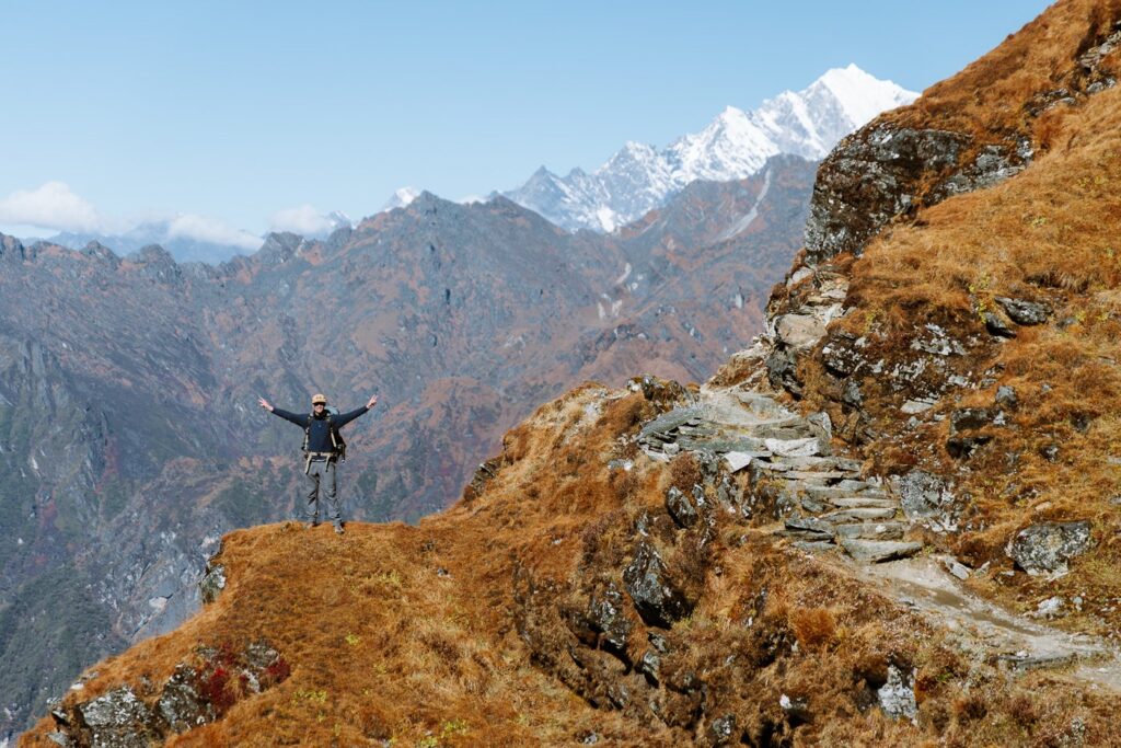 Trekker beneath Kusum Kangru on the way to Mera Peak, Nepal