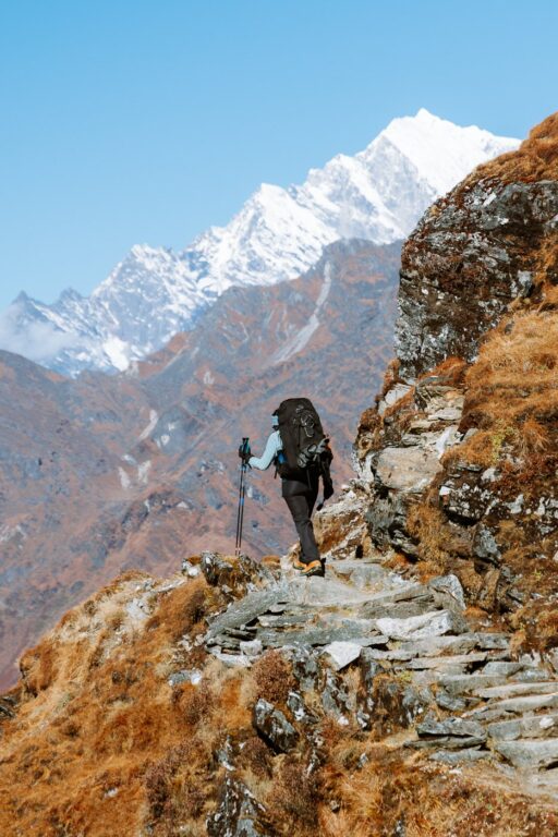 Trekker beneath Kusum Kangru on the way to Mera Peak, Nepal