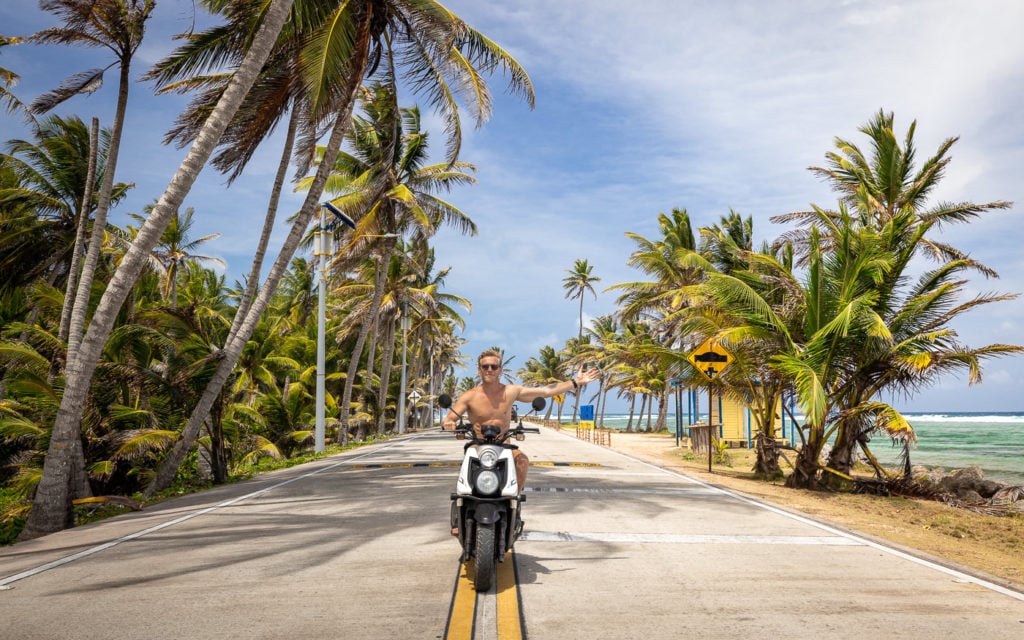 Scooter under the palm trees on San Andres