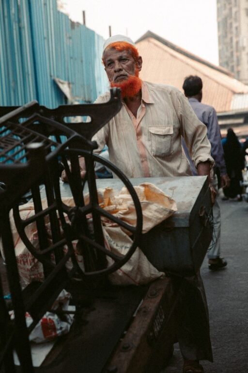 PORTRAIT OF A MAN IN MUMBAI'S THIEVES MARKET