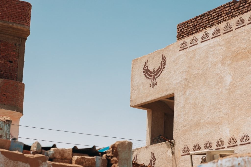 Nubian Village with emblem of Horus