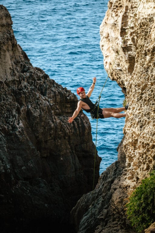 Rock Climbing the natural arch of Malta