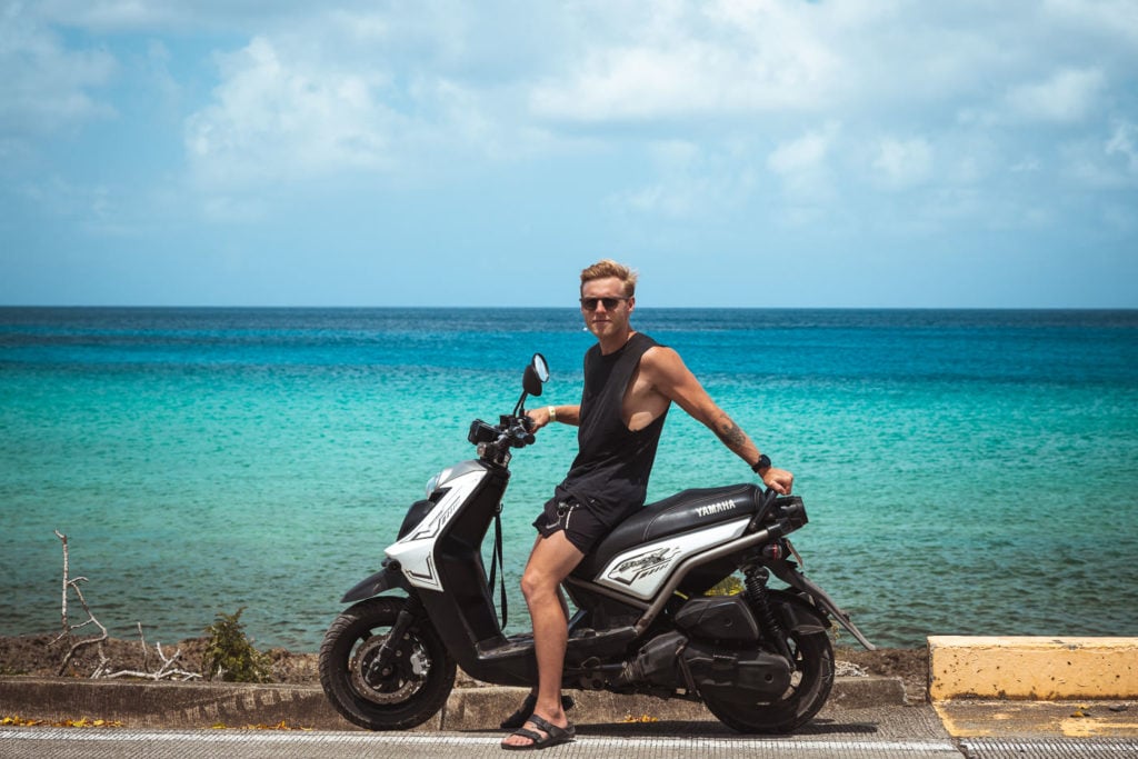 Man riding Moped on the beach