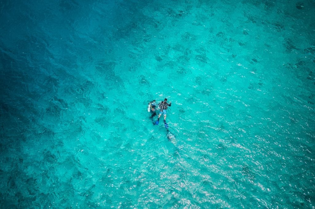 aerial view of scuba divers on San Andres Island Colombia