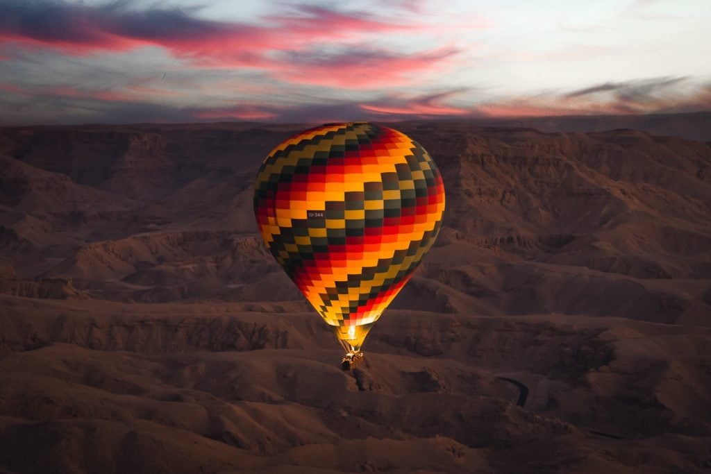 Hot air balloon over the valley of the kings near Luxor, Egypt