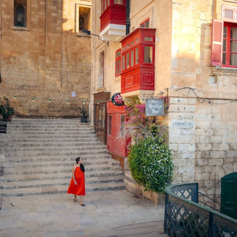 Girl walking in Valletta at the Bridge Bar
