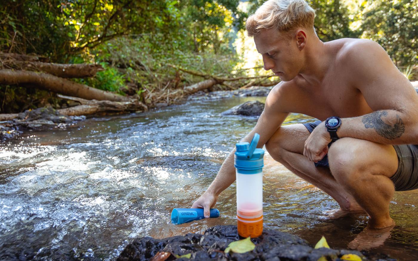 Using a water bottle filter for travel and hiking
