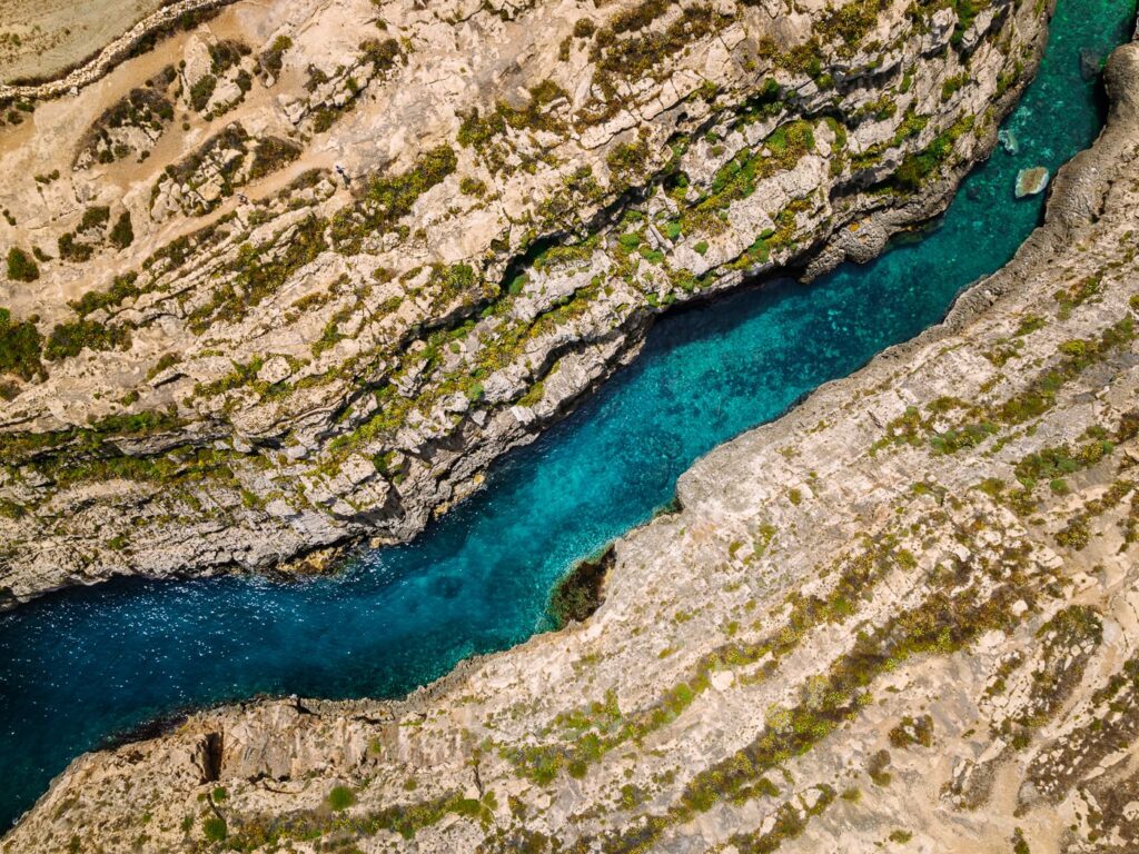 Blue water of Wied Il Ghasri Cove, Malta
