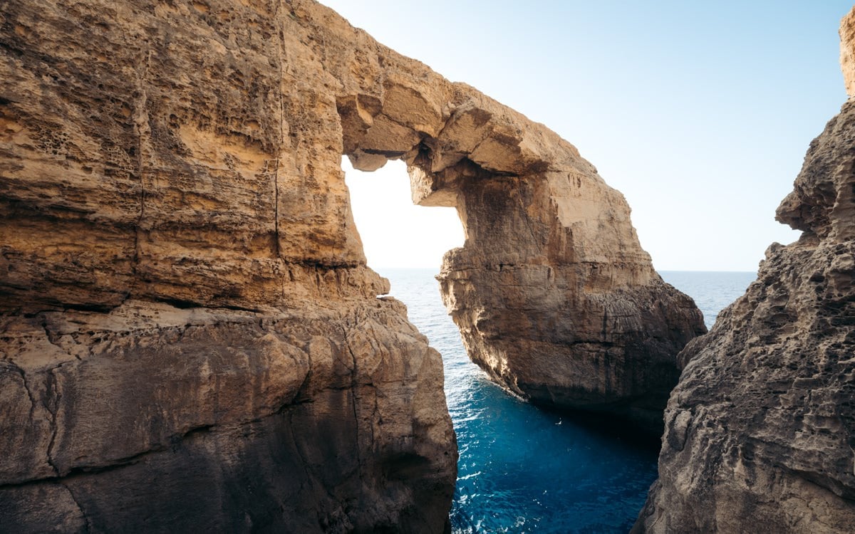 Wied Il Mielah Window natural limestone arch on Gozo Island, Malta